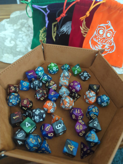 dice set with bags with animals on them